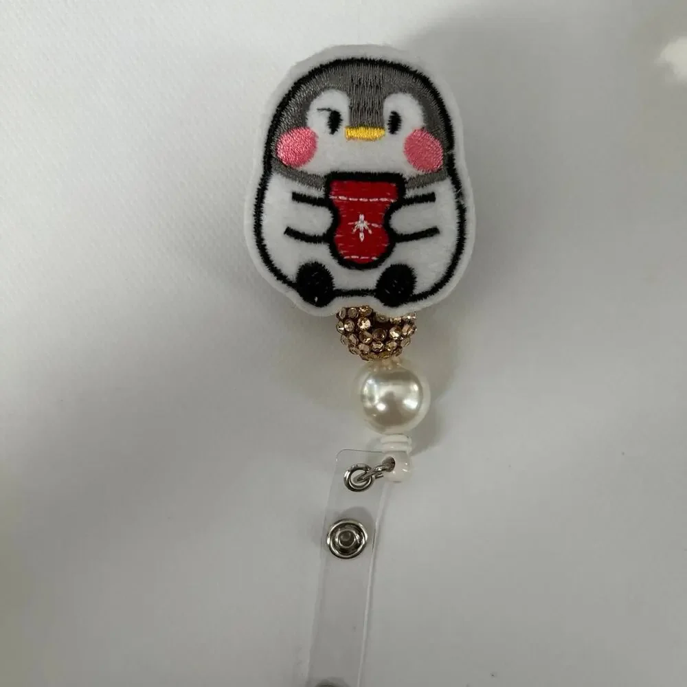 Penguin Badge Reel